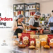 Packaging Solution for New Business showing workers filling and sealing printed pouches for dry fruits, namkeen, and festive snacks while a supervisor checks orders in a packaging facility